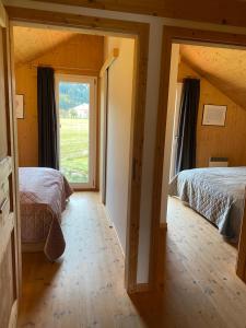 Een bed of bedden in een kamer bij Chalet Bellevue Murau