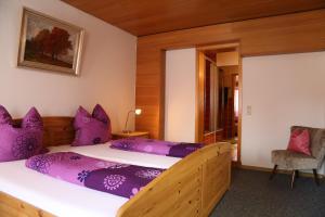 Postel nebo postele na pokoji v ubytování Hotel Bechtel