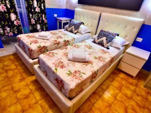 Кровать или кровати в номере Relaxon Guest House