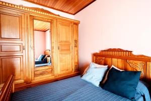 Кровать или кровати в номере O Fogar do Carpinteiro