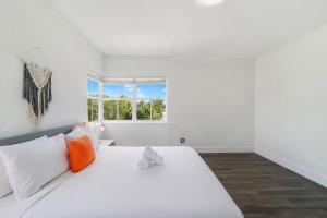 Rúm í herbergi á Treehouse Hotel