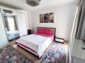 Postel nebo postele na pokoji v ubytování Madinty amazing view 2 rooms fully air-conditioned apartment at Madinty city for families only مدينتي