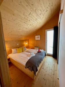 Een bed of bedden in een kamer bij Chalet Bellevue Murau