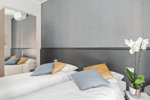 Postel nebo postele na pokoji v ubytování MK - Apartment Soderini