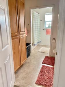a bathroom with a toilet and a sink in a room at Warm and Inviting in Grants Pass