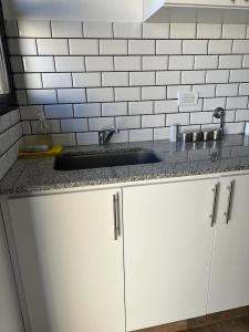 Kuchyň nebo kuchyňský kout v ubytování Departamento en Bragado A