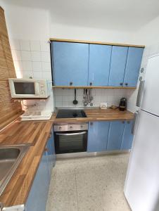 Kuchyň nebo kuchyňský kout v ubytování Apartamento Faro Torrox