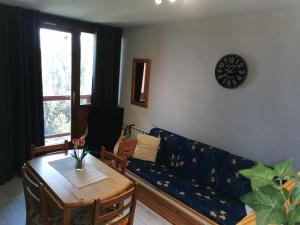 Posezení v ubytování Appartement Edelweiss Chamrousse vue sur Recoin La Croix de Chamrousse Grenoble