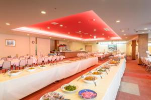 Ein Restaurant oder anderes Speiselokal in der Unterkunft Hotel Tagawa 