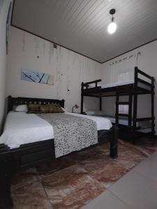 Postel nebo postele na pokoji v ubytování Salamandra Costa Rica