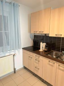Kép Modern Flat incl Parking, near Metro U1 szállásáról Bécsben a galériában