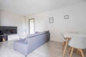 Televízia a/alebo spoločenská miestnosť v ubytovaní SWEET CONDO - 10 DISNEY - 1 MIN GARE