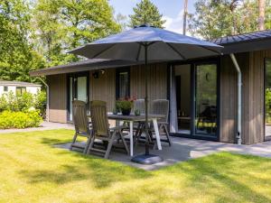 Taman di luar Lodge in Netherlands with Furnished Terrace