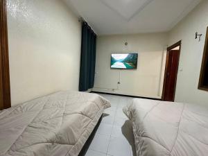 TV a/nebo společenská místnost v ubytování Jawhara Jacobs apartment