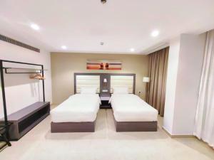 Krevet ili kreveti u jedinici u okviru objekta Wave View Hotel