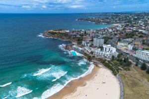 an aerial view of a beach and the ocean at EIGHT TWO NINE TWO III: BONDI BEACH in Sydney