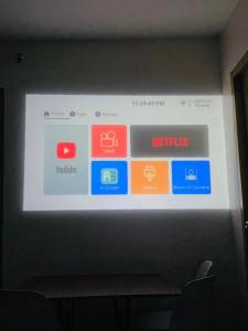 a projection screen with different colored icons on it at 4138 Davao City 2bedroom unit 8 Spatial Maa by Filinvest in Davao City
