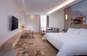 Foto sihtkohas Lianjiang asuva majutusasutuse Vienna International Hotel (Lianjiang Avenue Xinyuan International Plaza) galeriist