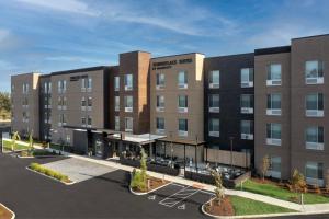 una imagen de la parte delantera de un edificio en TownePlace Suites by Marriott Cincinnati Mason en Mason