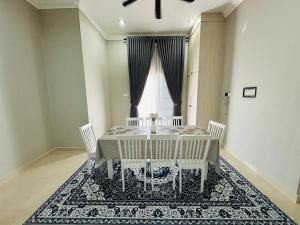 Et opholdsområde på Nawra Iman Holiday Home