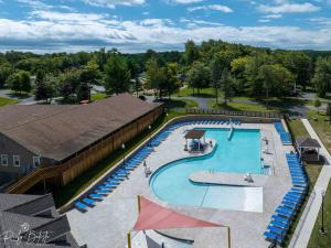 an overhead view of a swimming pool at a resort at Cozy, Spacious House *New*InTheCommunity+Fire Pit in Tobyhanna