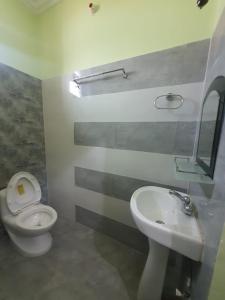 Koupelna v ubytování Shree Nanda Guest House