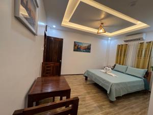 Postel nebo postele na pokoji v ubytování RICH-VANIA SUITES + 37 fotografií