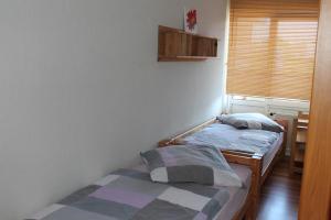 Postel nebo postele na pokoji v ubytování Ostsee-Ferienapartement K217 für 2-4 Personen