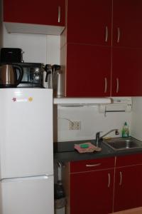 Ferienappartement K512 für 2-4 Personen in Strandnäheにあるキッチンまたは簡易キッチン