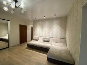 Posteľ alebo postele v izbe v ubytovaní Atlant luxury Big Family Perlina Apart on Golovna поряд з ТЦ Депот