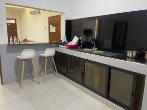 O bucătărie sau chicinetă la TD Guest House 8-Villa Sky