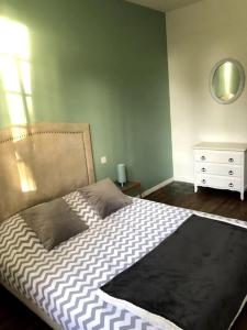 Postel nebo postele na pokoji v ubytování Le Brighton