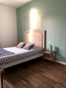 Postel nebo postele na pokoji v ubytování Le Brighton + 5 fotografií