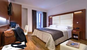 Posteľ alebo postele v izbe v ubytovaní Hotel Lo Zodiaco
