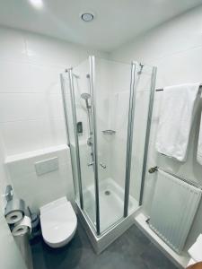 Koupelna v ubytování E&D Hotel Rodgau + 37 fotografií