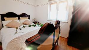 Letto o letti in una camera di Villa Nostalgia pool & wellness