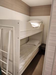 Voodi või voodid majutusasutuse Hotel Pavillon Du Zoute toas