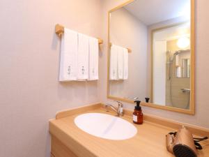 Salle de bains dans l'établissement Beppu Hatto Onyado Nono Beppu