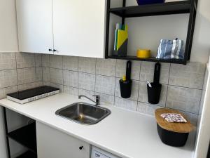 Kuchyň nebo kuchyňský kout v ubytování Apartments Hannah + 32 fotografií