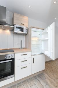 Kuchyň nebo kuchyňský kout v ubytování Residenz Hafenidyll + 37 fotografií