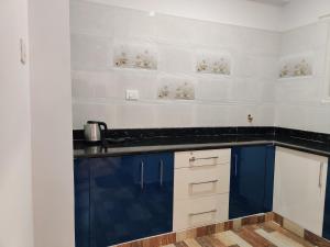 Kuchyň nebo kuchyňský kout v ubytování SkyHouse Homestay