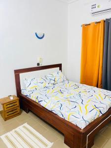 En eller flere senge i et værelse på Charly-Calavi Appartement