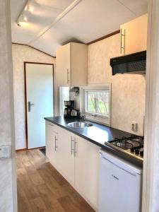 Kuchyň nebo kuchyňský kout v ubytování Chalet De Miranda + 6 fotografií