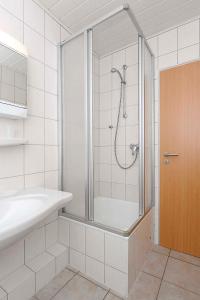 Koupelna v ubytování Haus Nordseesterne
