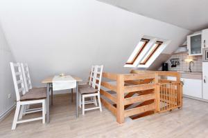 Kuchyň nebo kuchyňský kout v ubytování Haus Nordseesterne