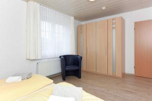Postel nebo postele na pokoji v ubytování Haus Nordseesterne