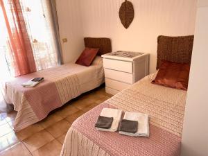 Łóżko lub łóżka w pokoju w obiekcie Castle 411