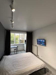Postel nebo postele na pokoji v ubytování Smart Modern loft apartments