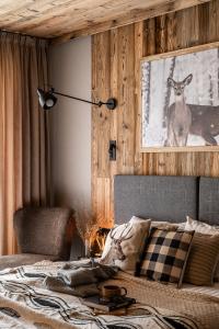 Posteľ alebo postele v izbe v ubytovaní ApartSki 18d