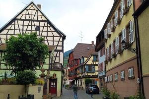 a street in a town with many buildings at Ferienwohnung Schwörer bis 7 Personen in Rheinhausen